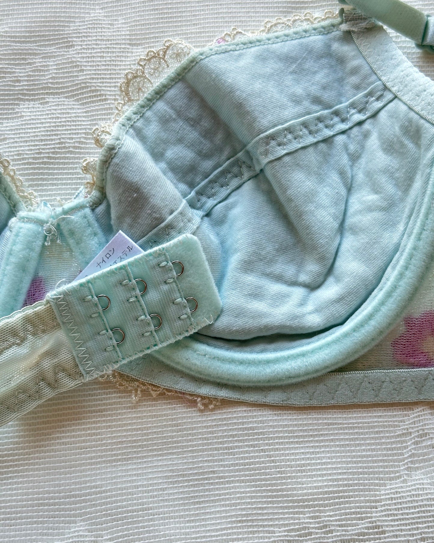 Baby blue Japanese brassiere featuring purple embroidered flowers