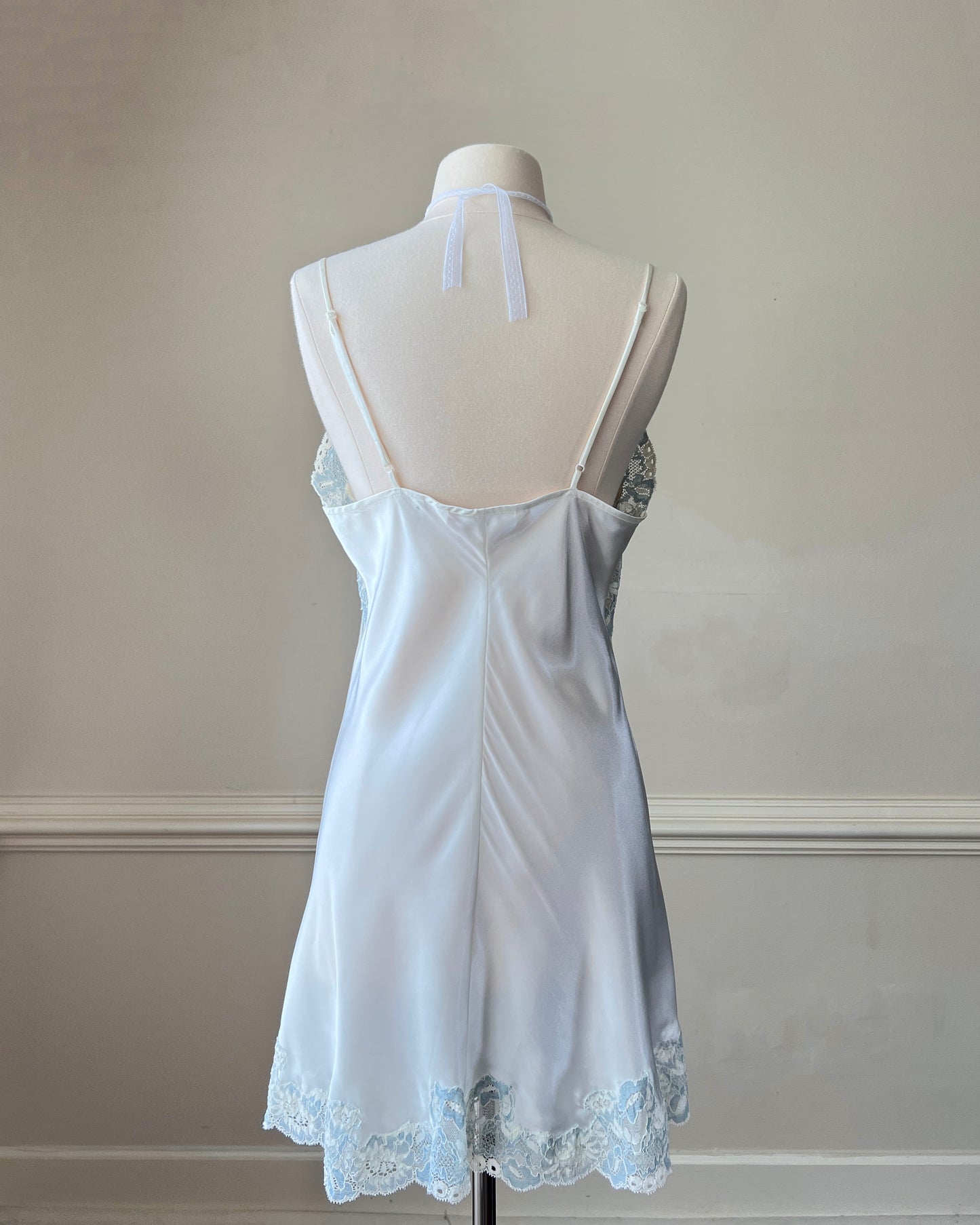 Vintage Victoria’s Secret ivory satin mini slip with blue lace