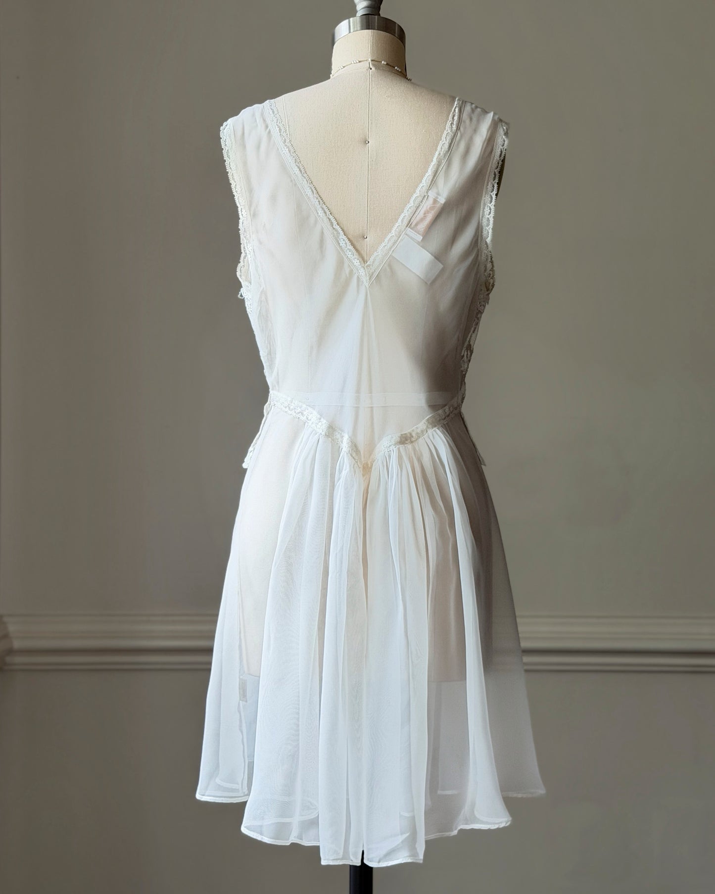 Delicates Ivory Lace Babydoll Dress β Deep V-Neck