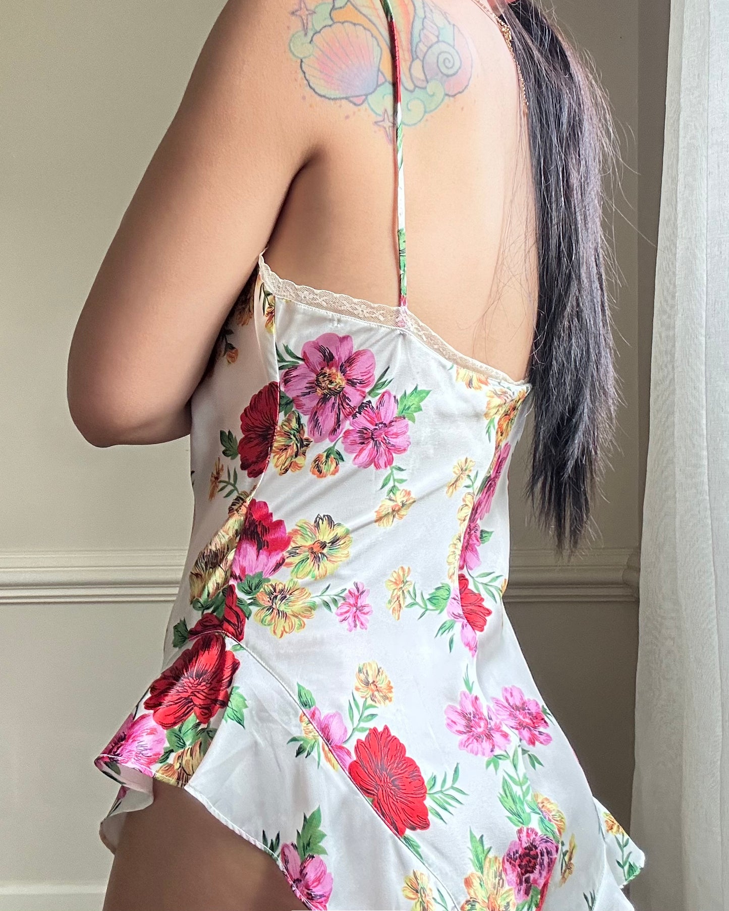 Victoria’s Secret’s Feminine Satin Bodysuit featuring Vibrant Floral Prints