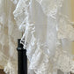 Frederick’s stunning bridal-inspired sheer slip dress featuring crimson red velvet bustier patch detail