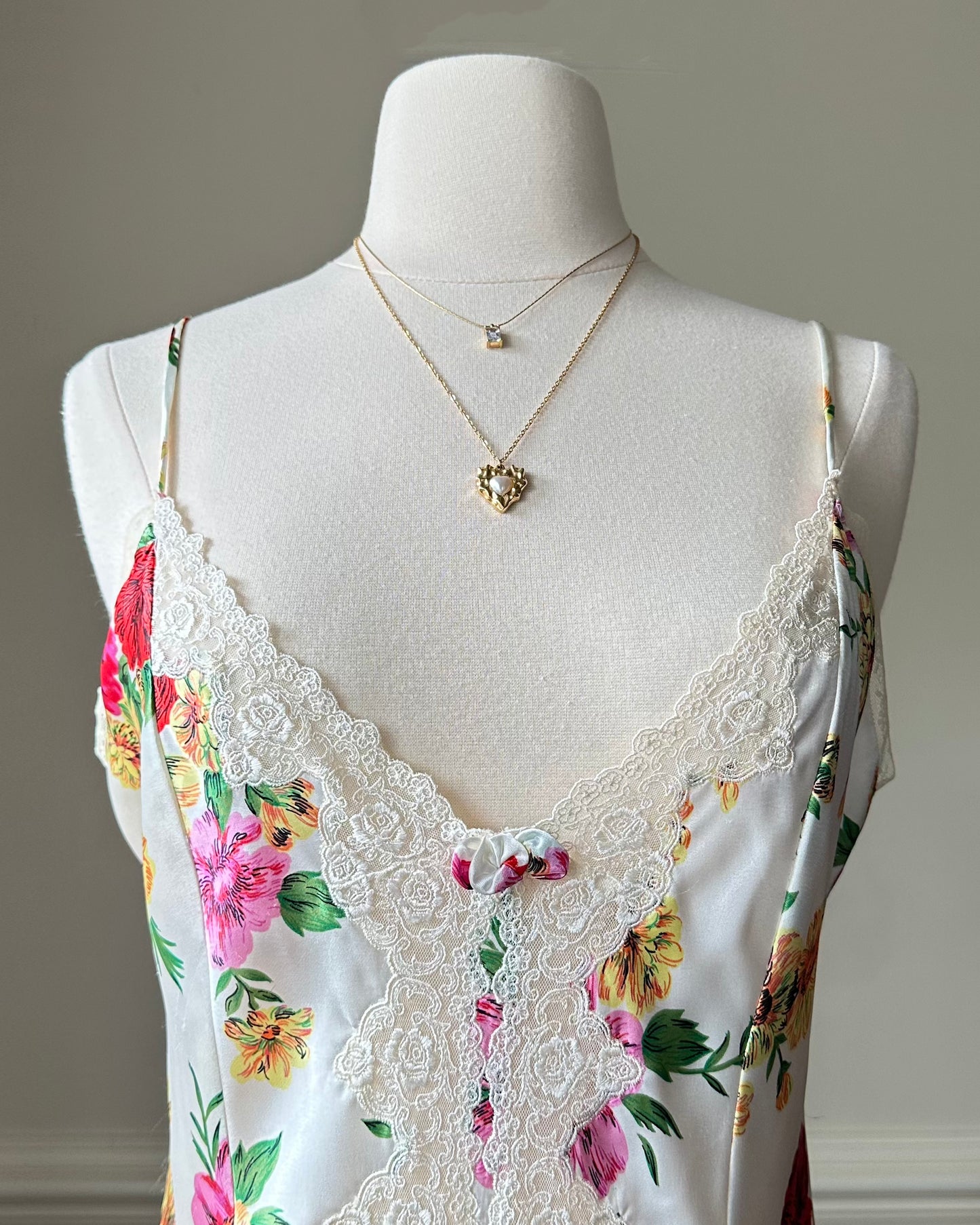 Victoria’s Secret’s Feminine Satin Bodysuit featuring Vibrant Floral Prints