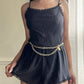 Teddy Romper in Satin Black featuring Geometric Pleating Patterns Laced Lining