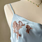 Victoria’s Secret satin soft blue slip dress featuring intricate lace embroidered