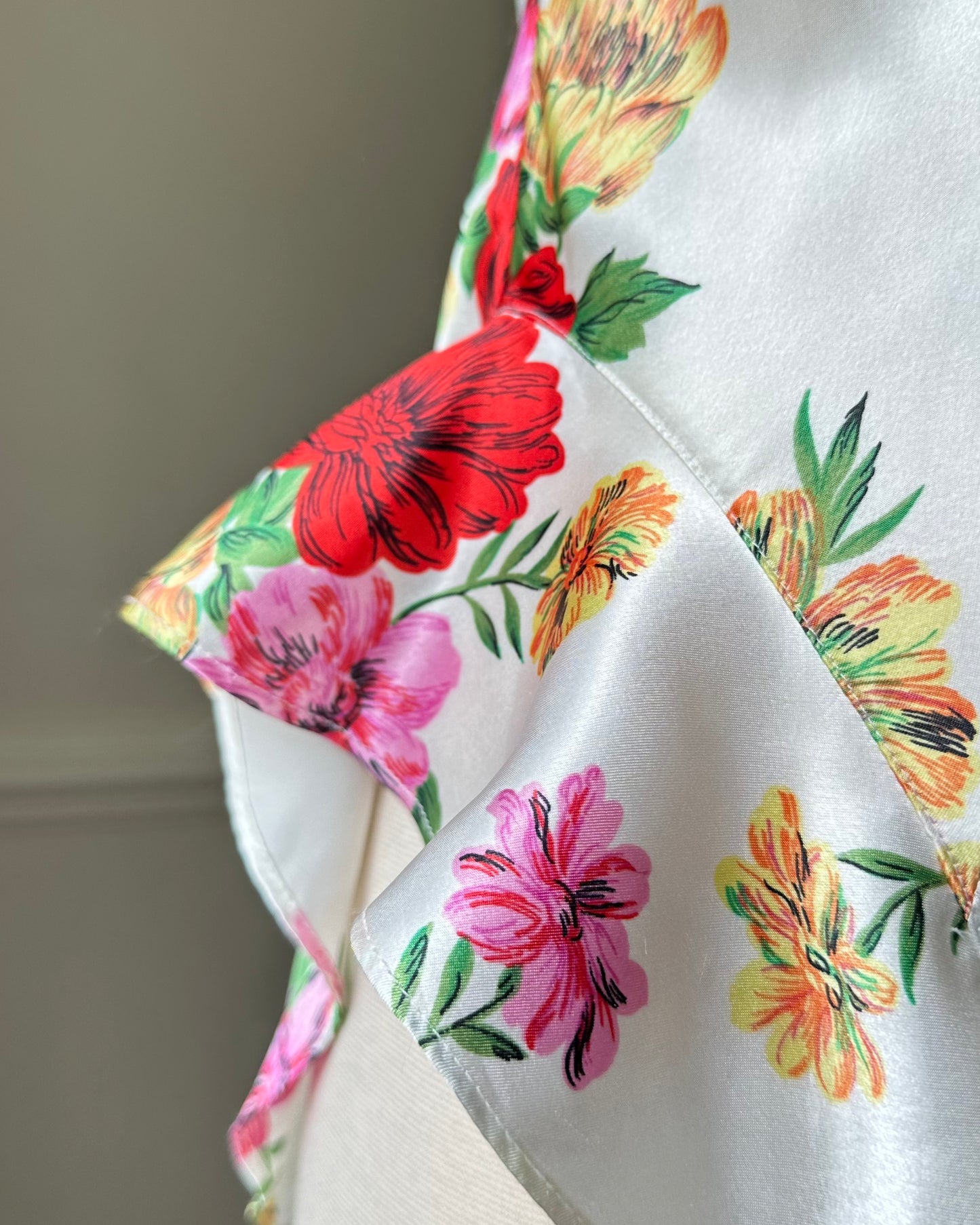 Victoria’s Secret’s Feminine Satin Bodysuit featuring Vibrant Floral Prints