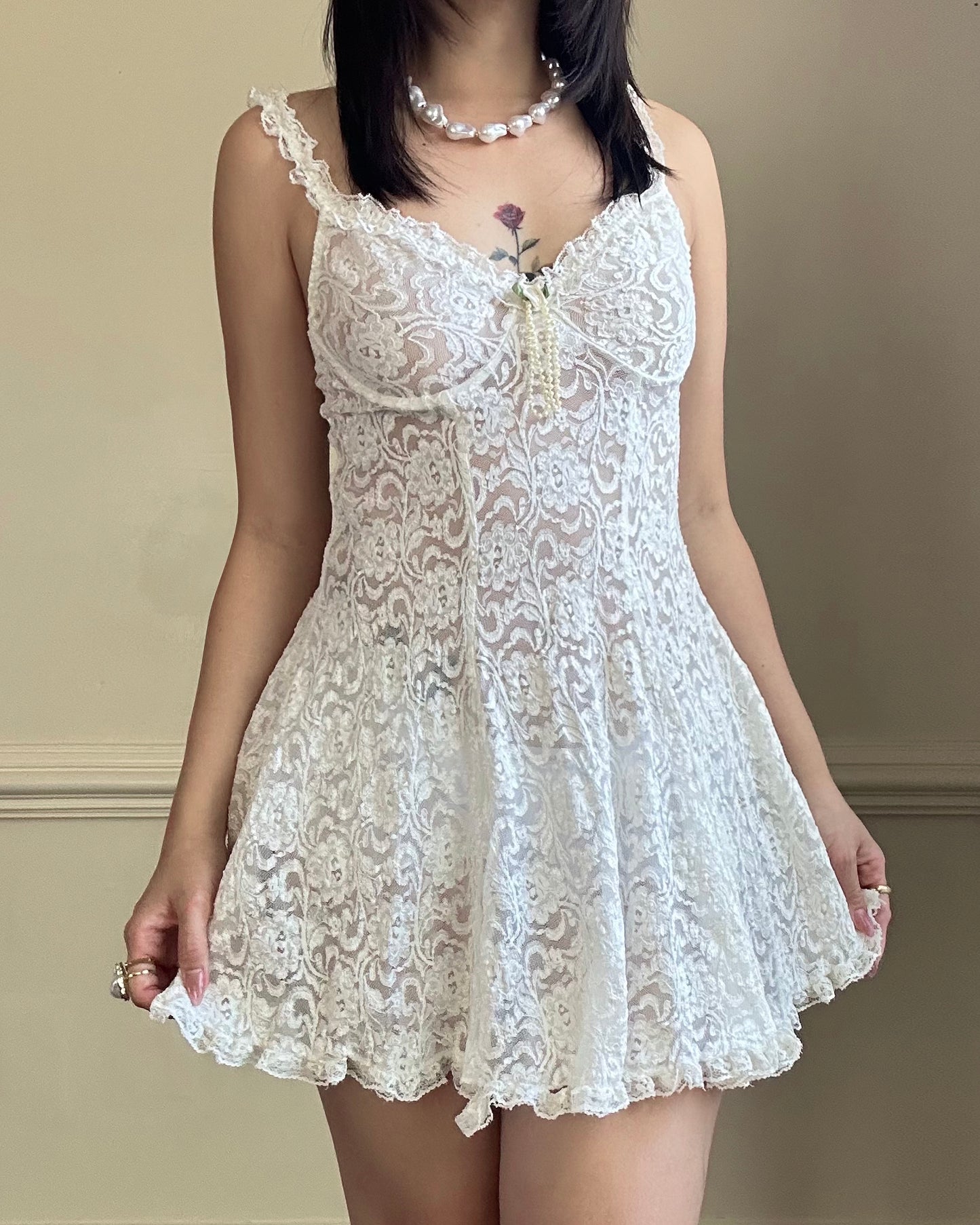 Vintage ivory lace slip dress with a romantic allover floral pattern