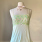 Fairycore soft green camisole featuring leaves and floral embroidered bust