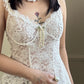 Vintage ivory lace slip dress with a romantic allover floral pattern