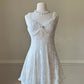 Vintage ivory lace slip dress with a romantic allover floral pattern