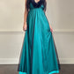 Emerald green maxi dress featuring sheer black mesh layout