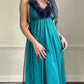 Emerald green maxi dress featuring sheer black mesh layout