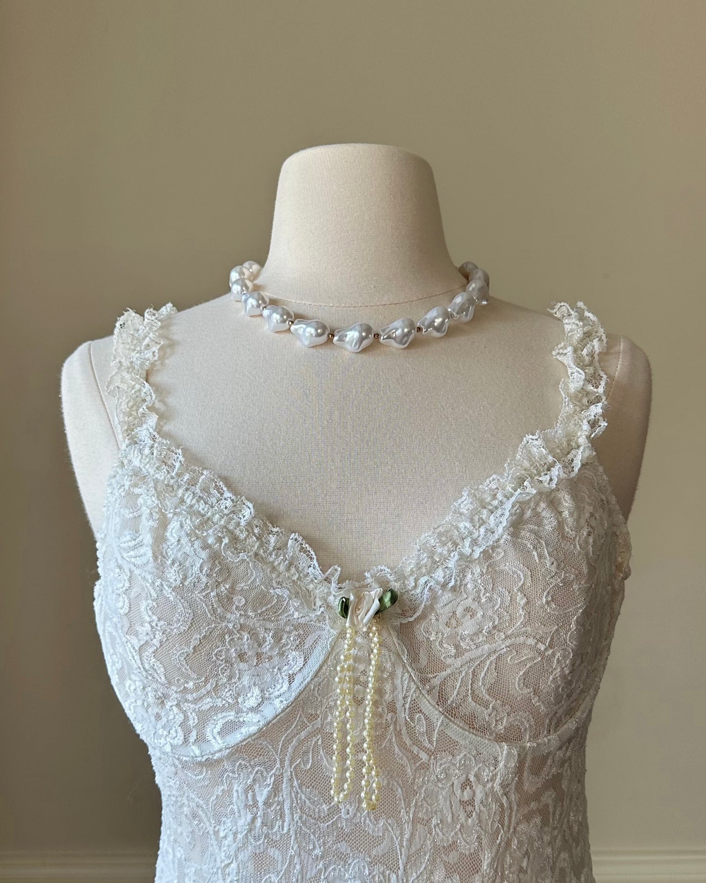 Vintage ivory lace slip dress with a romantic allover floral pattern