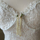 Vintage ivory lace slip dress with a romantic allover floral pattern
