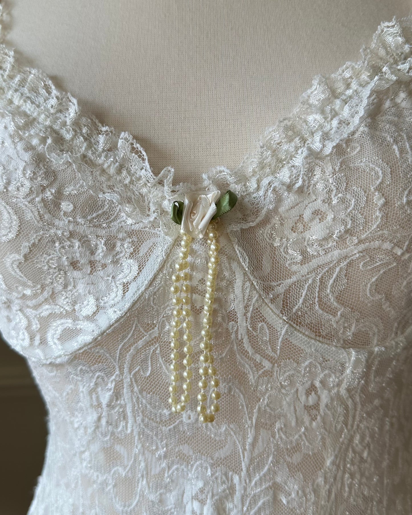 Vintage ivory lace slip dress with a romantic allover floral pattern