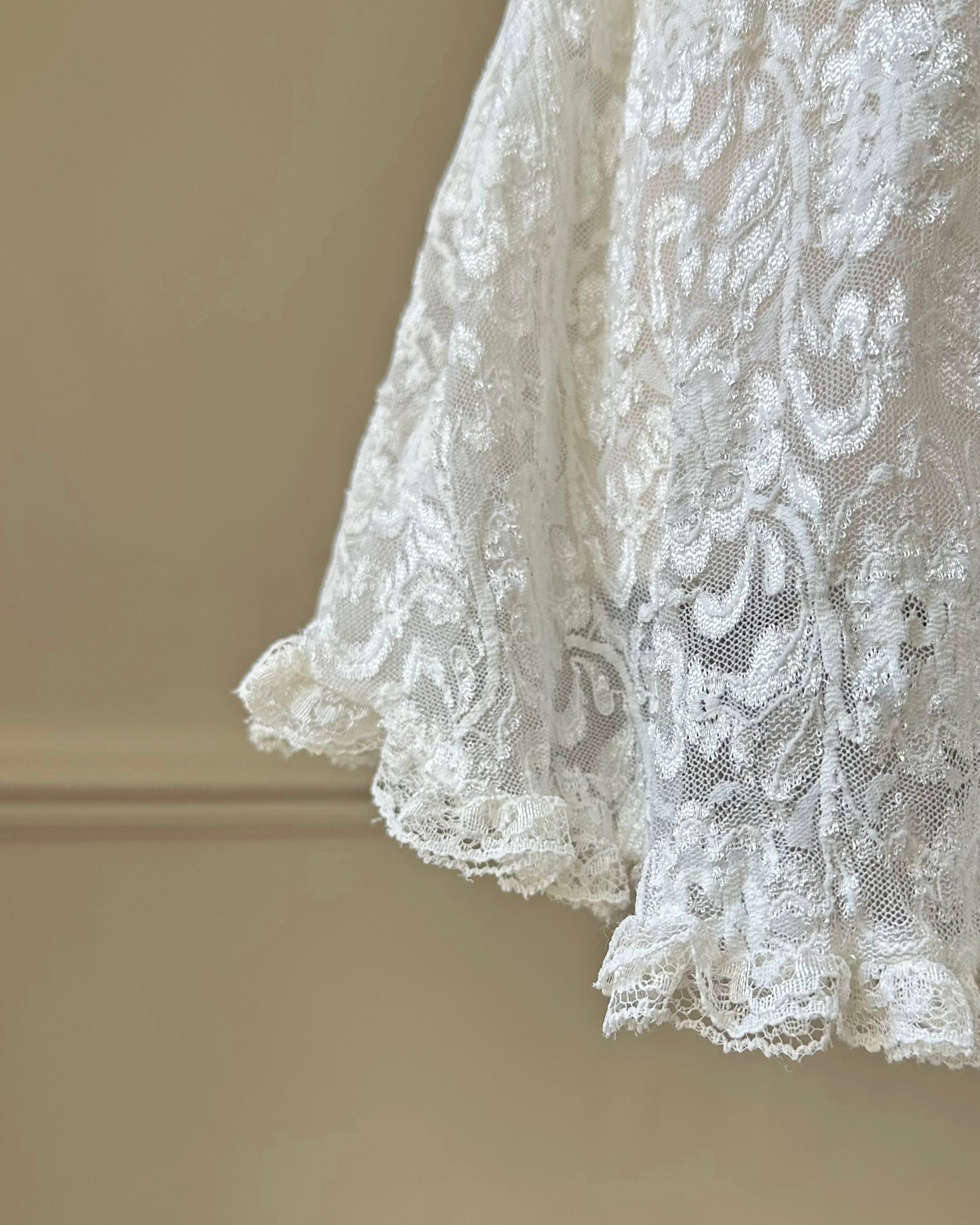 Vintage ivory lace slip dress with a romantic allover floral pattern