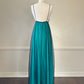 Emerald green maxi dress featuring sheer black mesh layout