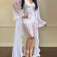 Sheer mesh maxi robe featuring floral embroidery ruffled sleeves and lining