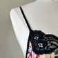 Valmode semi sheer black slip dress featuring vibrant peonies print