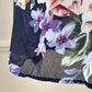 Valmode semi sheer black slip dress featuring vibrant peonies print