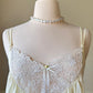 Victorian Inspired Pastel Yellow Midi Dress featuring Intricate Floral Embroidery