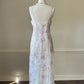 Vintage ivory satin slip dress with a bold pastel floral print