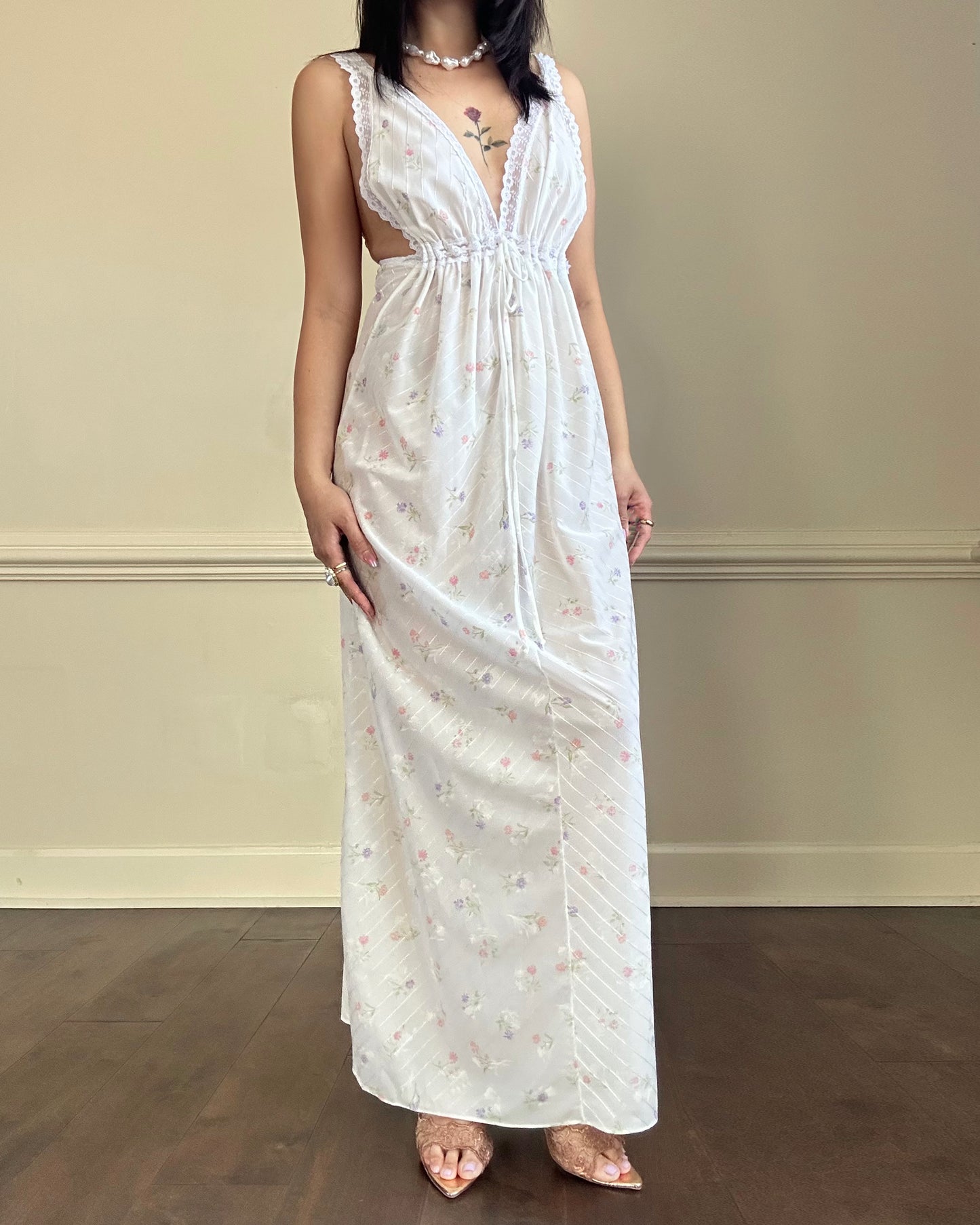 Vintage white maxi nightgown with pastel floral print and subtle satin stripe texture