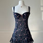 Dark feminine bustier corset dress featuring rose vines embroidery