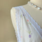 Vintage white maxi nightgown with pastel floral print and subtle satin stripe texture