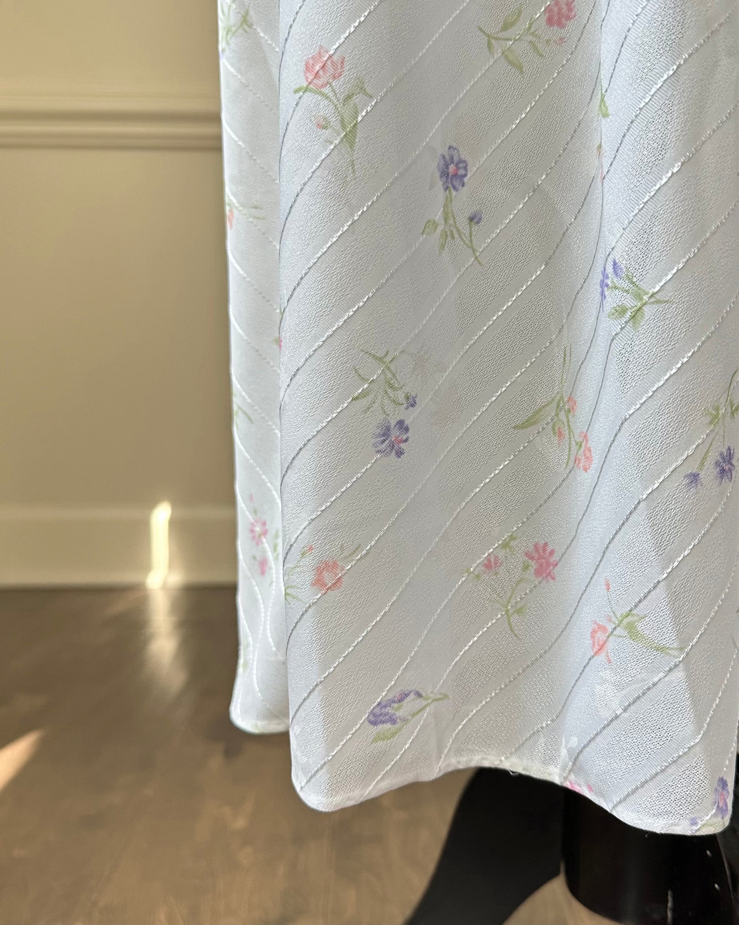 Vintage white maxi nightgown with pastel floral print and subtle satin stripe texture