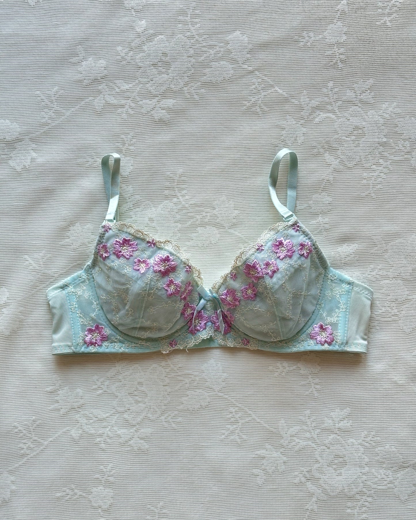 Baby blue Japanese brassiere featuring purple embroidered flowers