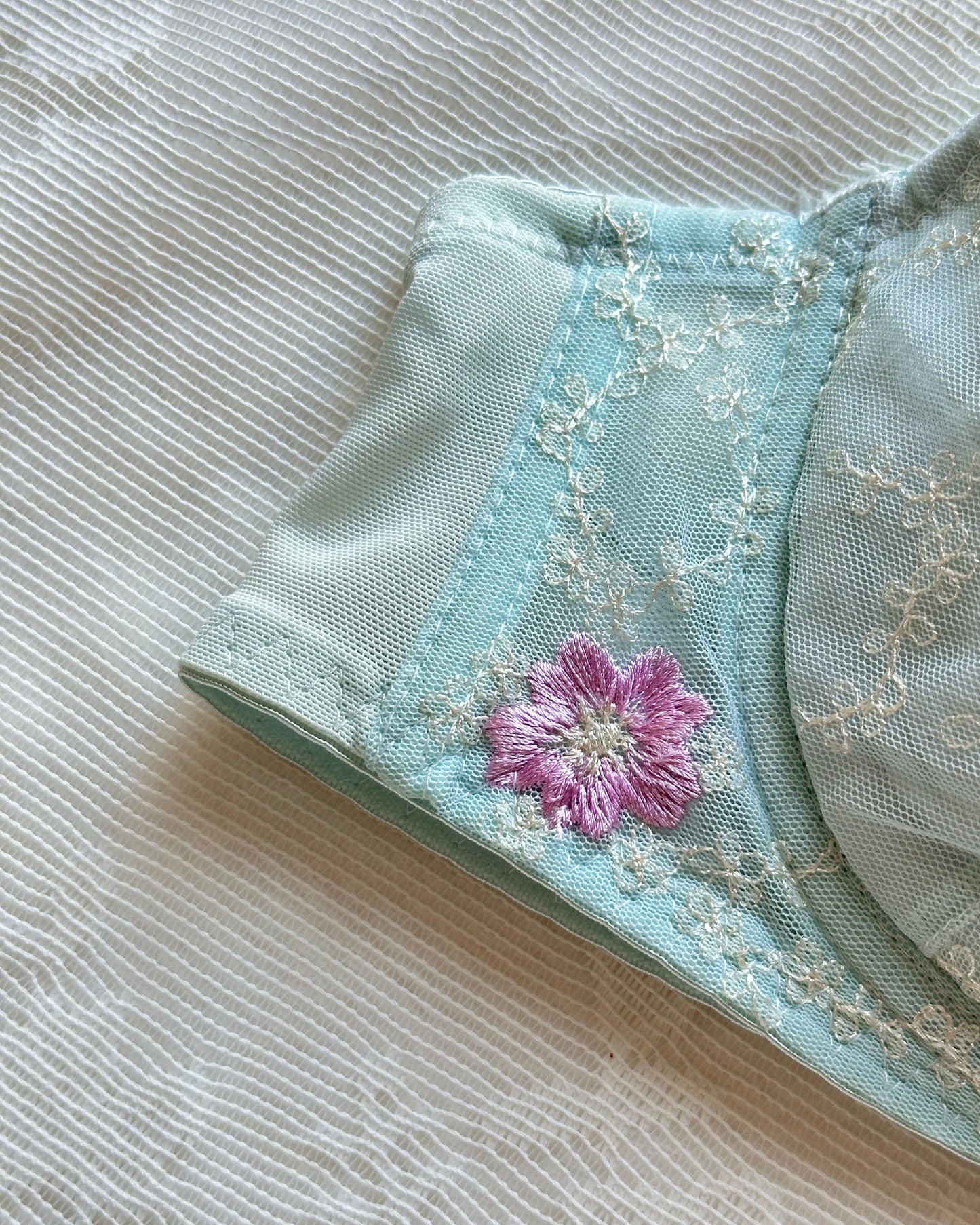 Baby blue Japanese brassiere featuring purple embroidered flowers