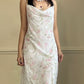 Vintage floral slip dress featuring a soft cowl neckline