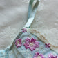Baby blue Japanese brassiere featuring purple embroidered flowers