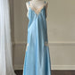 Ethereal sky blue satin maxi dress featuring rosettes embroidery bust