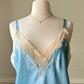 Ethereal sky blue satin maxi dress featuring rosettes embroidery bust