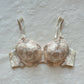 Vintage cream Japanese brassiere featuring neutral intricate embroidered