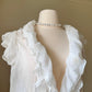 Stunning Rop featuring Layered Ruffled Details with Crinkled Material