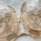 Vintage cream Japanese brassiere featuring neutral intricate embroidered