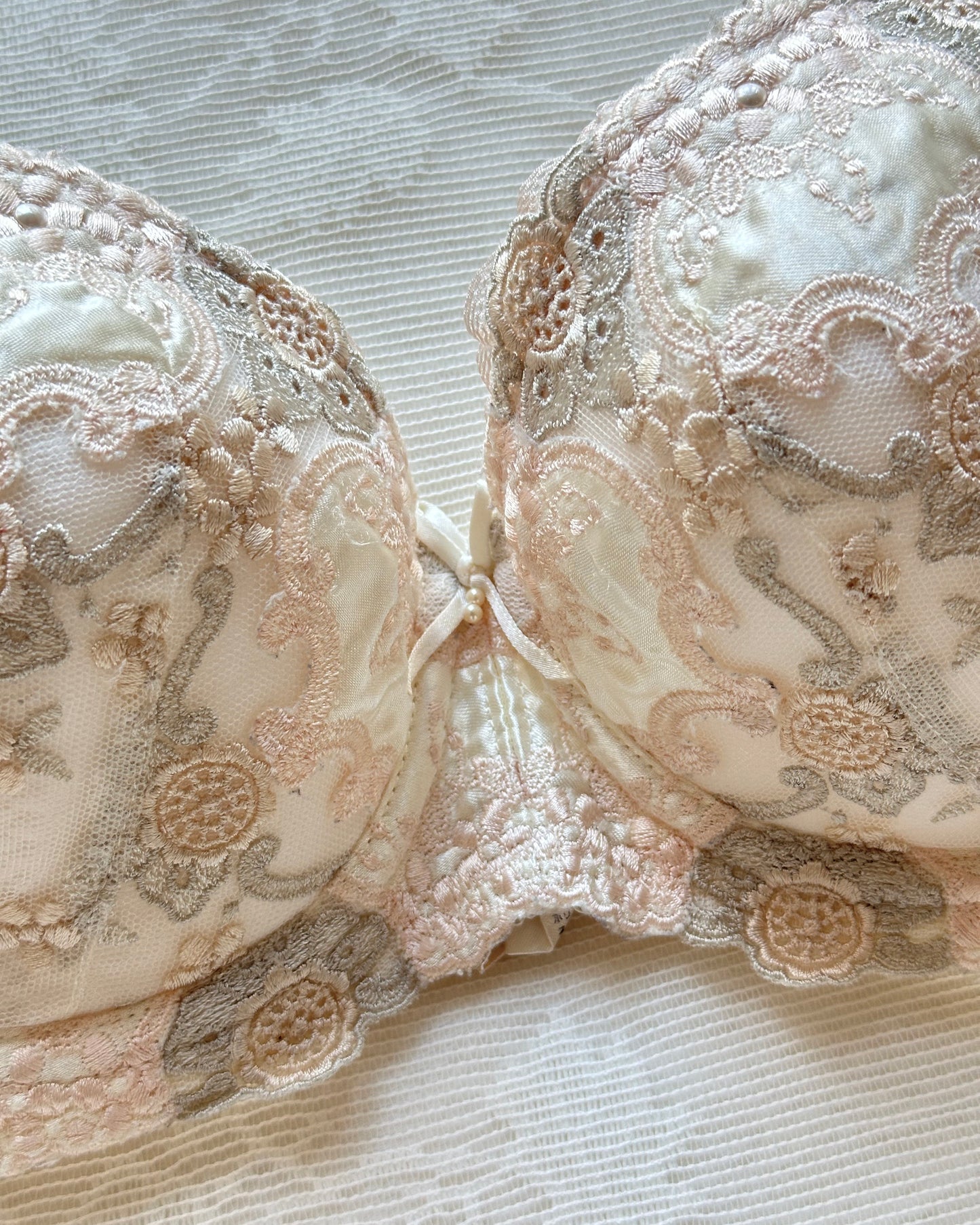 Vintage cream Japanese brassiere featuring neutral intricate embroidered