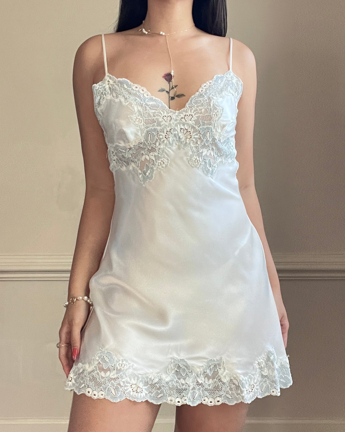 Vintage Victoria’s Secret ivory satin mini slip with blue lace