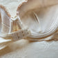 Vintage cream Japanese brassiere featuring neutral intricate embroidered