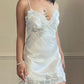 Vintage Victoria’s Secret ivory satin mini slip with blue lace