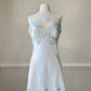 Vintage Victoria’s Secret ivory satin mini slip with blue lace