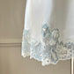 Vintage Victoria’s Secret ivory satin mini slip with blue lace
