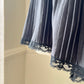 Teddy Romper in Satin Black featuring Geometric Pleating Patterns Laced Lining
