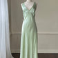 Fairy goddess soft green maxi slip dress featuring deep v neckline