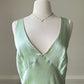Fairy goddess soft green maxi slip dress featuring deep v neckline