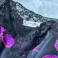 Vintage DIOR’s satin black bodysuit featuring vibrant purple floral prints