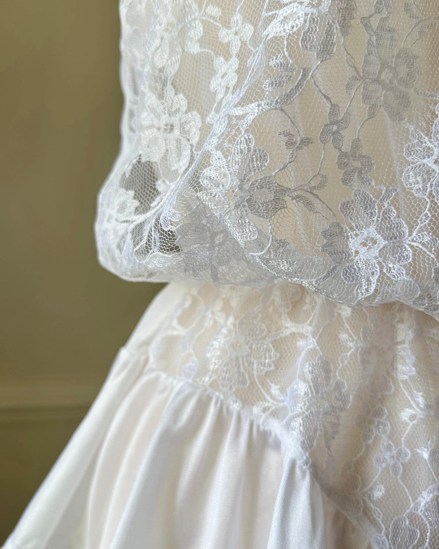 Sheer White Bodysuit featuring Delicate Sheer Lace Bodice with Flared Skirt