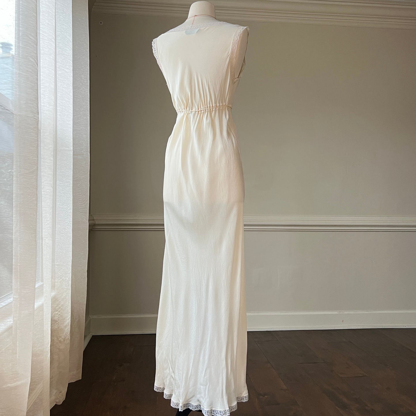 Christian Dior’s ethereal sheer maxi dress in vintage creamy